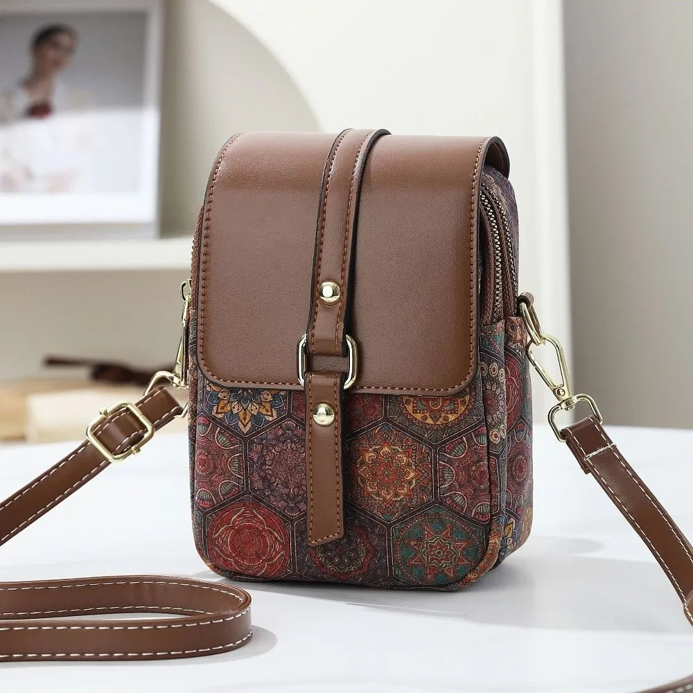 Bohemian style printed PU leather phone bag with ethnic design, versatile crossbody handbag for women, single shoulder strap.