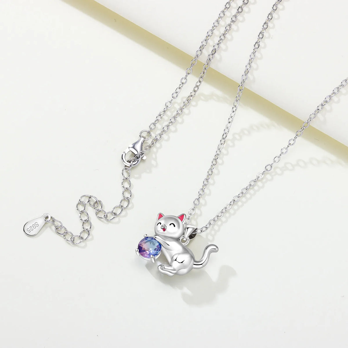 Sterling silver cat pendant necklace for women featuring cute animal design, perfect as a birthday gift or fashionable jewelry.