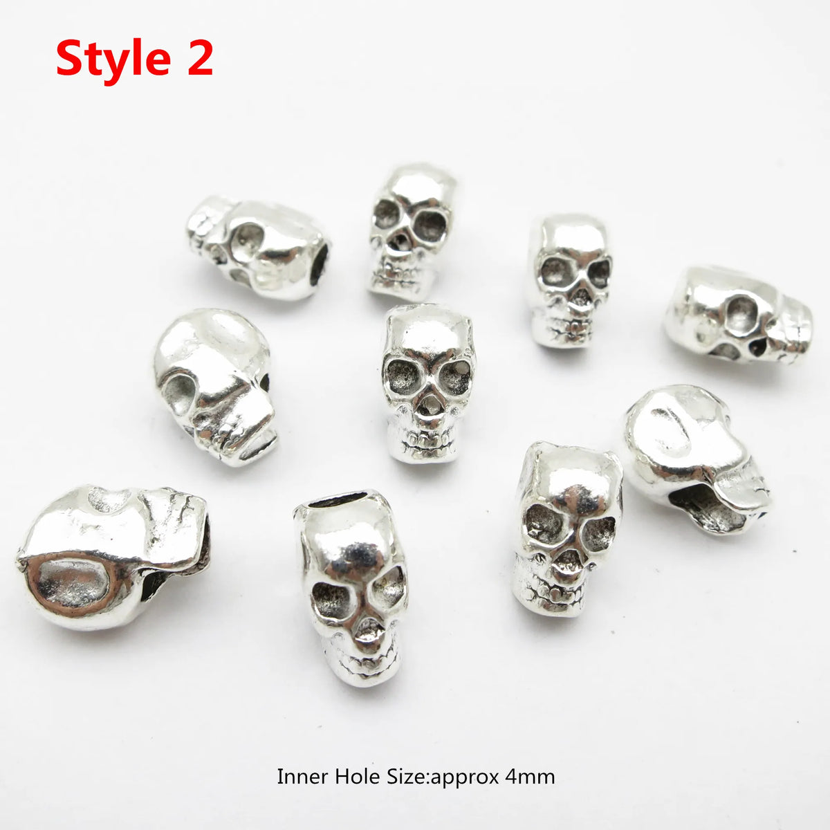 Silver Viking rune hair braid beads for dreadlocks and beards, close-up view