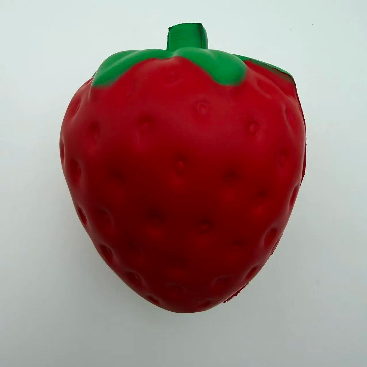 Large Giant Strawberry Squishy Toy from HSF Marketplace, slow rising stress relief sensory fruit toy for adults.