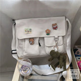 Women’s casual canvas messenger bag with printed design, HSF Marketplace handbag, shoulder strap, and pouch for everyday use.