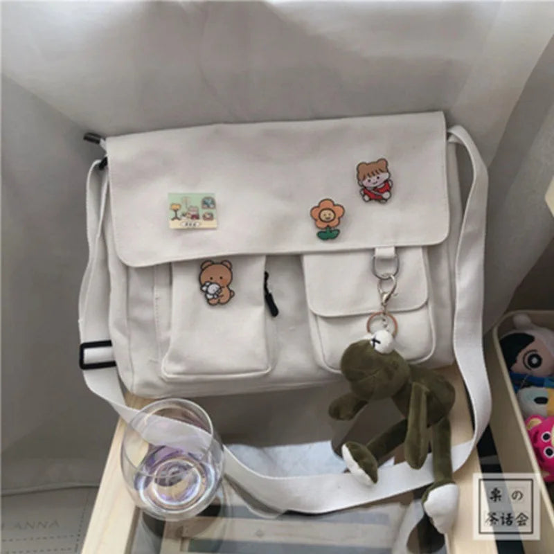 Women’s casual canvas messenger bag with printed design, HSF Marketplace handbag, shoulder strap, and pouch for everyday use.