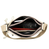 High capacity HSF Marketplace women's canvas shoulder crossbody bag with three main pockets and multiple compartments.
