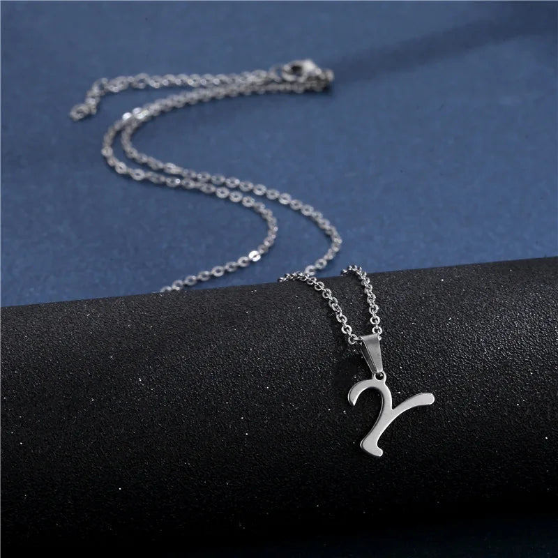 Shiny stainless steel initial letter pendant necklace for women with a simple clavicle chain choker jewelry style.