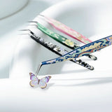 High precision stainless steel eyelash extension tweezers by Sticker Therapy, angled close-up:VEVENT