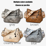 Vintage soft leather women's shoulder purse with multi-pocket design and ethnic pattern strap, ideal for everyday use.