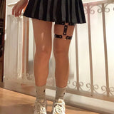 Women’s elastic PU leather thigh garter leg ring with heart rivets, spikes, and punk goth harness styling