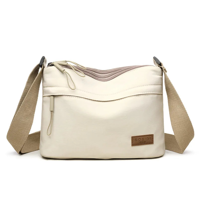 High-capacity HSF Marketplace canvas shoulder bag with three main pockets, perfect for women and mothers for shopping and everyday use.