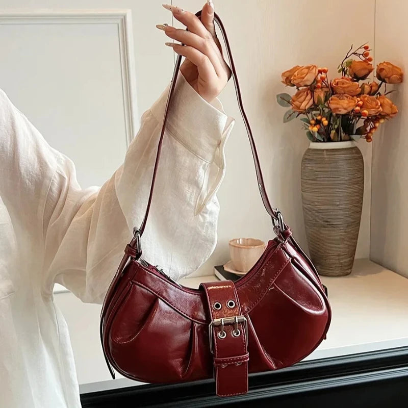 Fashion PU shoulder handbag with buckle decoration, large capacity, solid color, all-match design for women.