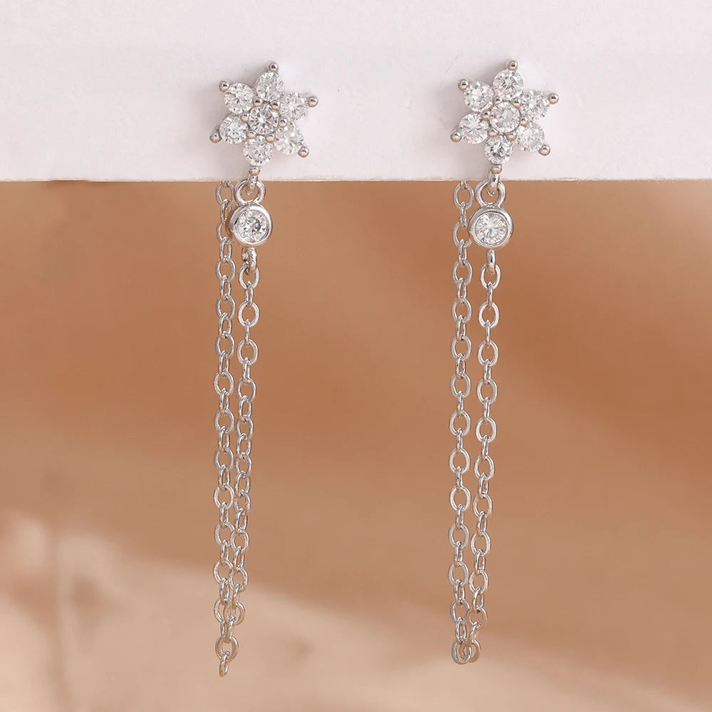 Stainless steel star dangle earrings with sparkling zircons by HSF Marketplace