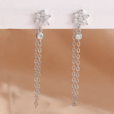 Stainless steel star dangle earrings with sparkling zircons by HSF Marketplace