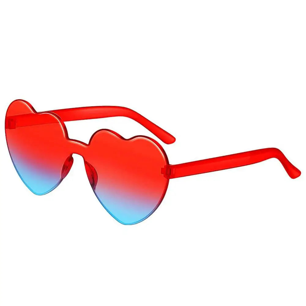 Pink love heart-shaped sunglasses for women with big vintage frames, UV400 protection, outdoor fashion eyewear by HSF Marketplace.