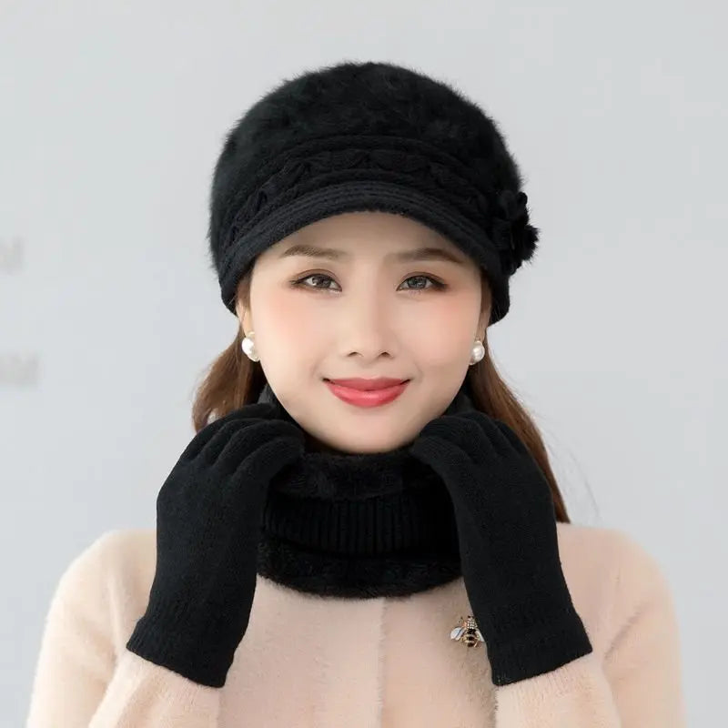 Warm knitted women’s winter hat, scarf, and gloves set in soft textured fabric