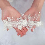 2-piece embroidered bridal garter thigh belt with pearl flower detail and elastic leg loops for weddings or parties