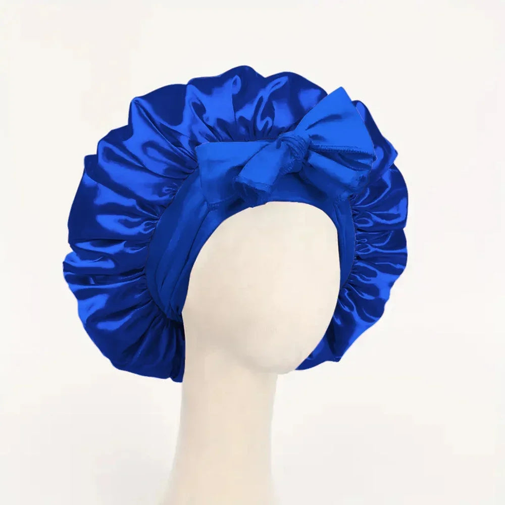 Silk satin sleep bonnet with adjustable tie band, suitable for women and men to protect hair during sleep, by HSF Marketplace.