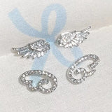 Sparkly full diamond angel wings geometric hollow stud earrings in silver-tone metal for women