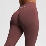 Women's seamless bum shaping leggings with ribbed waistband and scrunch butt detail for yoga and gym workouts