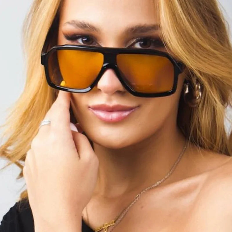 Vintage square sunglasses for women and men by HSF Marketplace, featuring rectangular black frames and tinted lenses.