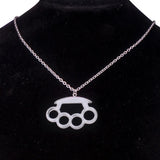 Resin imitation four-finger boxing glove pendant necklace with metal chain, stylish women's jewelry accessory.