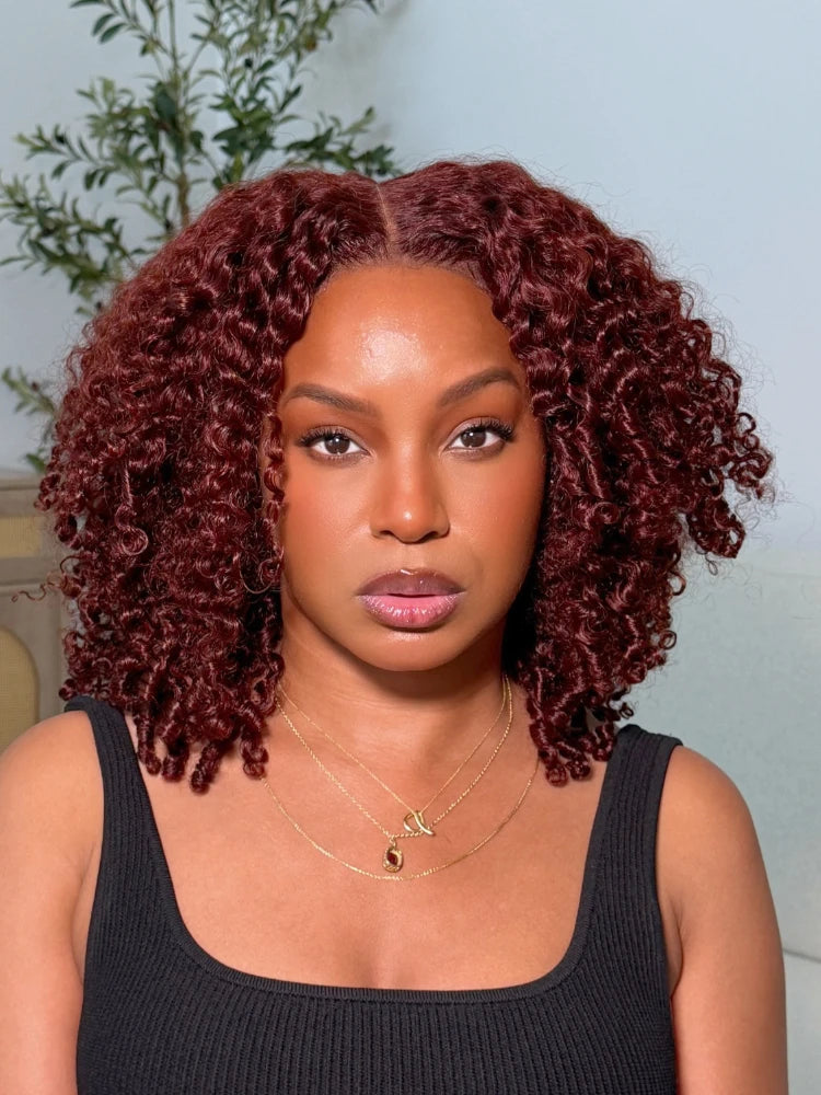 Reddish brown curly glueless human hair wig by HSF Marketplace on a model