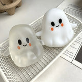 Coconut oil pumpkin ghost squishy toy by HSF Marketplace for stress relief