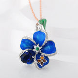 Blue enamel flower dangle earrings in 925 sterling silver by HSF Marketplace