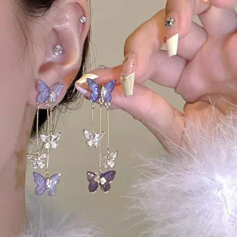Purple butterfly drop earrings with rhinestone details by HSF Marketplace