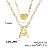 Tiny heart initial necklace for women with gold and silver layered charms, HSF jewelry brand