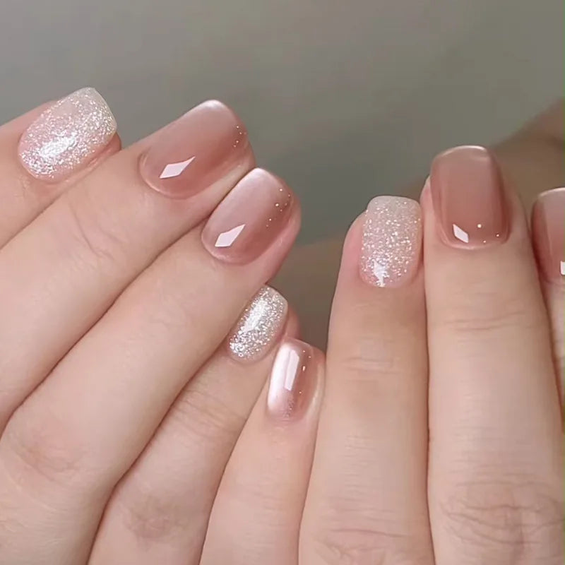 24-piece cute girly short square false nails with white French tips, glitter stars, rhinestones, cat eye, and bow art