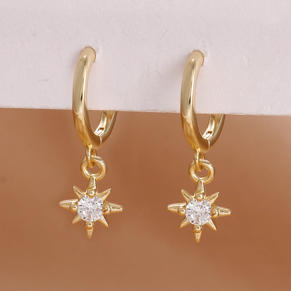 Stainless steel star dangle earrings with sparkling zircon accents by HSF Marketplace