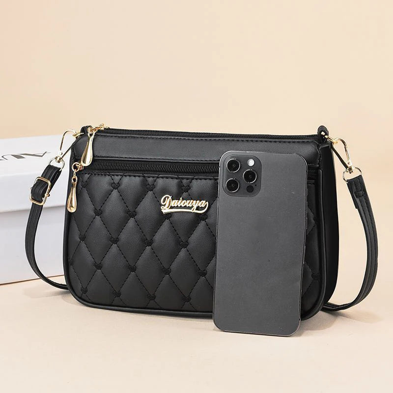 PU leather crossbody handbag with embroidery thread, zipper closure, large capacity, stylish shoulder bag for women.