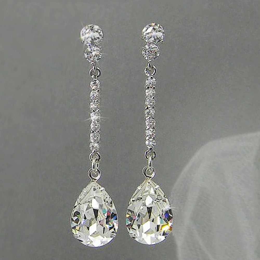 Huitan long hanging earrings with AAA pear-cut cubic zirconia stones, elegant drop jewelry design