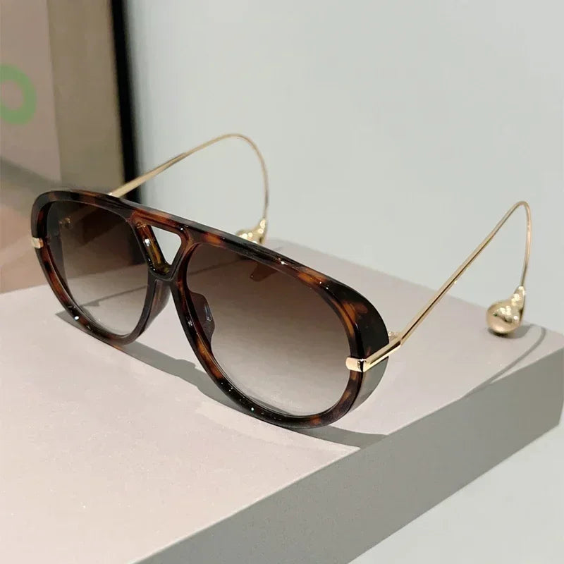 Oversized pilot sunglasses with double bridge design, gradient lenses, metal frames, trendy luxury style for women.