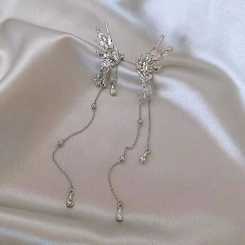 Trendy flower drop earrings with long tassels and rhinestones by HSF Marketplace