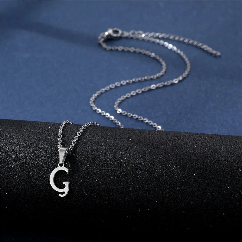 Sterling stainless steel initial letter pendant necklace for women, featuring a glossy, simple chain choker jewelry piece.
