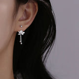 Vintage lotus earrings in 925 sterling silver for women, featuring delicate floral detailing