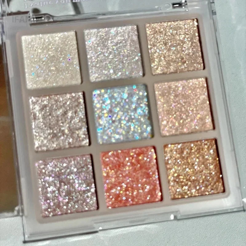 9-color glitter eyeshadow palette with earth tones, pearlescent shimmer, and blue-purple sparkling shades by HSF Marketplace
