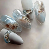 24-piece romantic Y2K gradient blue French press-on false nails with gold moon designs, almond shape by HSF Marketplace