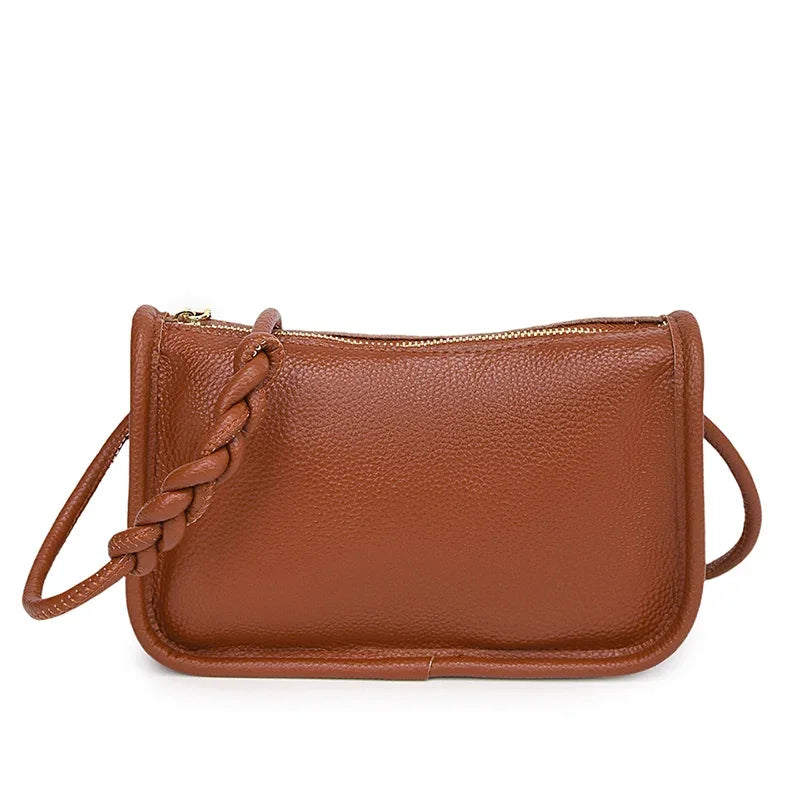 Genuine cowhide leather crossbody handbag for women, high-capacity shoulder purse, stylish and durable for daily use.