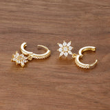 Stainless steel star dangle earrings with sparkling zircon accents by HSF Marketplace