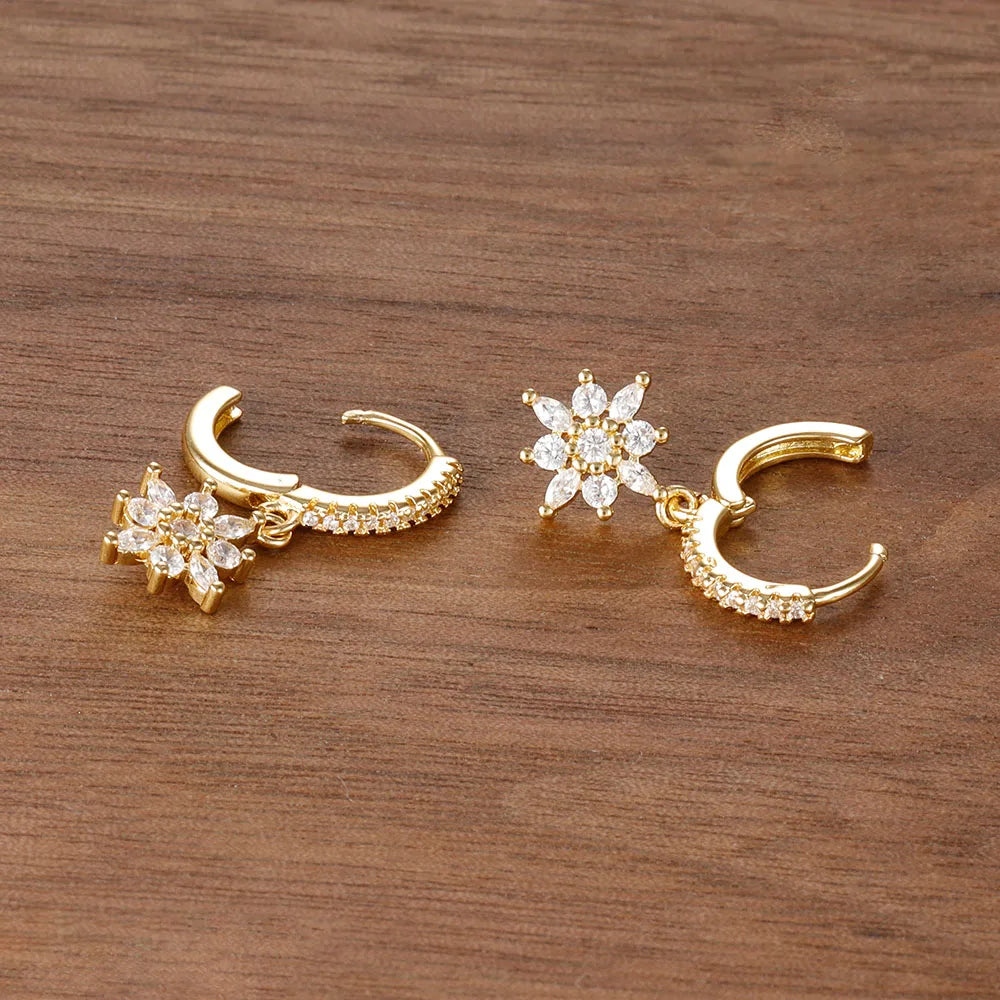 Stainless steel star dangle earrings with sparkling zircon accents by HSF Marketplace