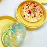 Set of crystal mini dumplings and steamed bun squishy toys with steamer, soft squeeze stress relief sensory toys for relaxation and fidgeting.