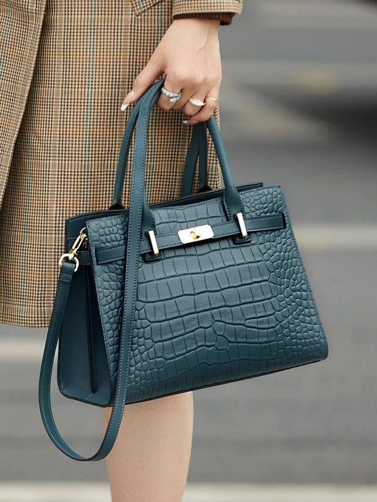 Genuine leather shoulder handbag for women featuring a sleek design, perfect for business and casual use, by HSF Marketplace.