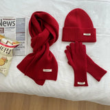 Women's knitted hat scarf glove set in warm winter design for autumn and winter weather