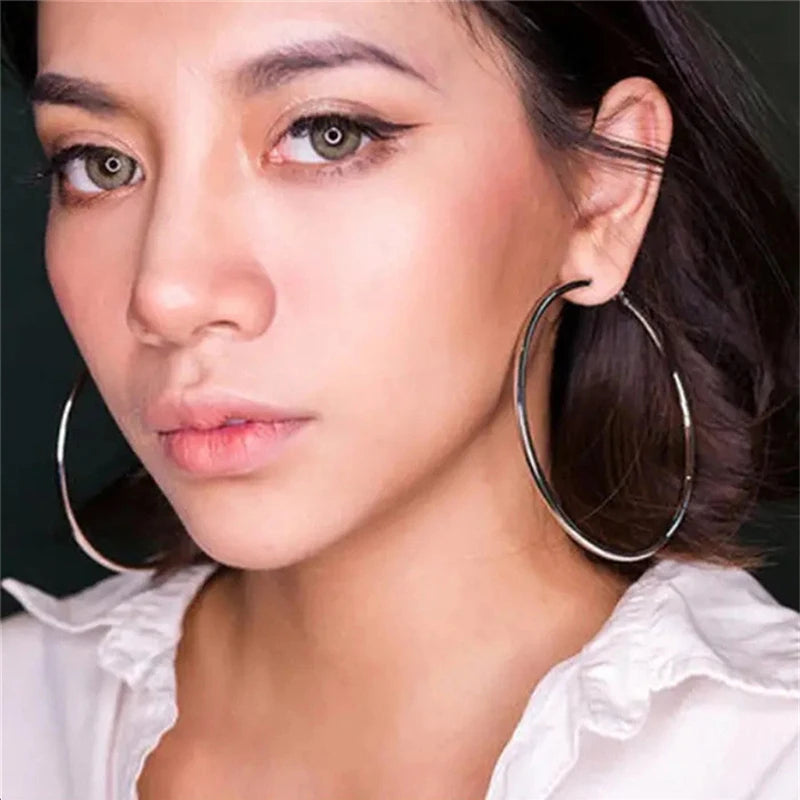 Classic stainless steel hoop earrings for women, available in 30–80mm sizes