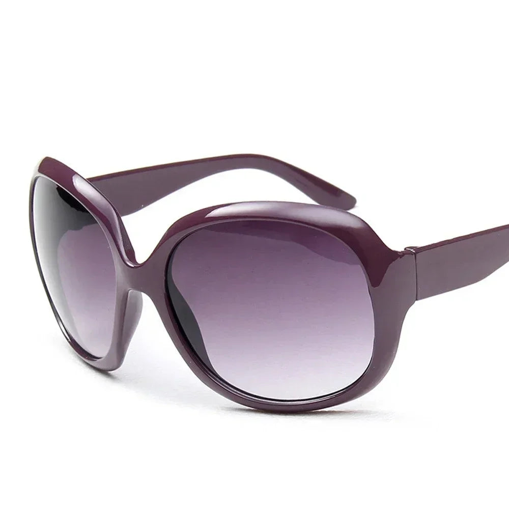 Retro classic oval sunglasses for women by HSF Marketplace, stylish fashion sunglasses with a feminine design and brand logo.