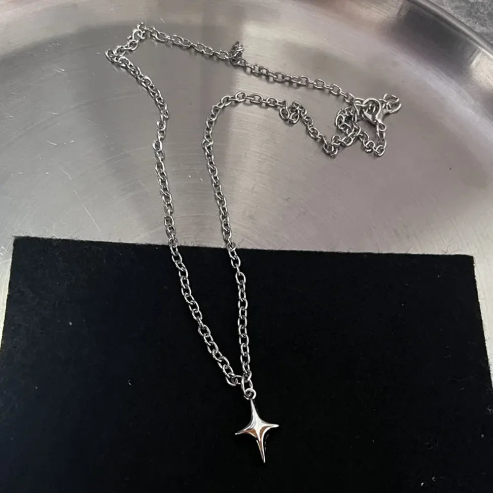Silver music note heart necklace featuring treble and bass clef charms, infinity love pendant, stainless steel jewelry for women.