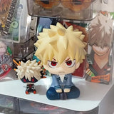 Anime Nendoroid collectible figures of Bakugou, Midoriya, Todoroki, and Toga displayed together
