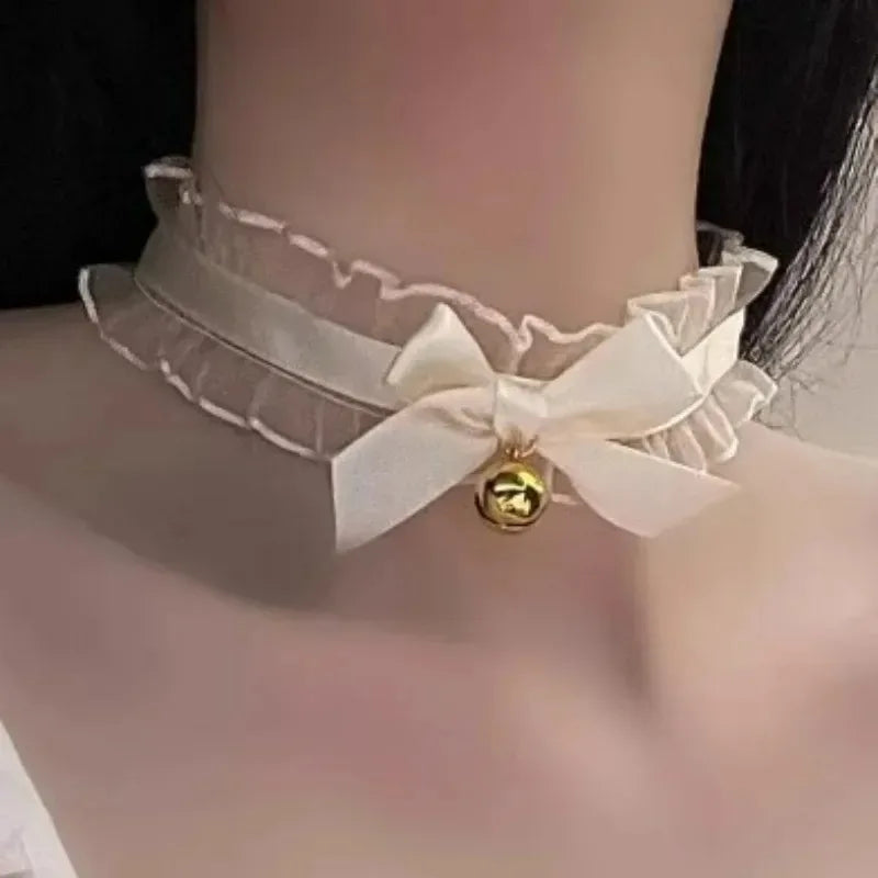 Cute women's lace collar choker necklace with bow and small bell pendant, gothic and fashion jewelry by HSF Marketplace.