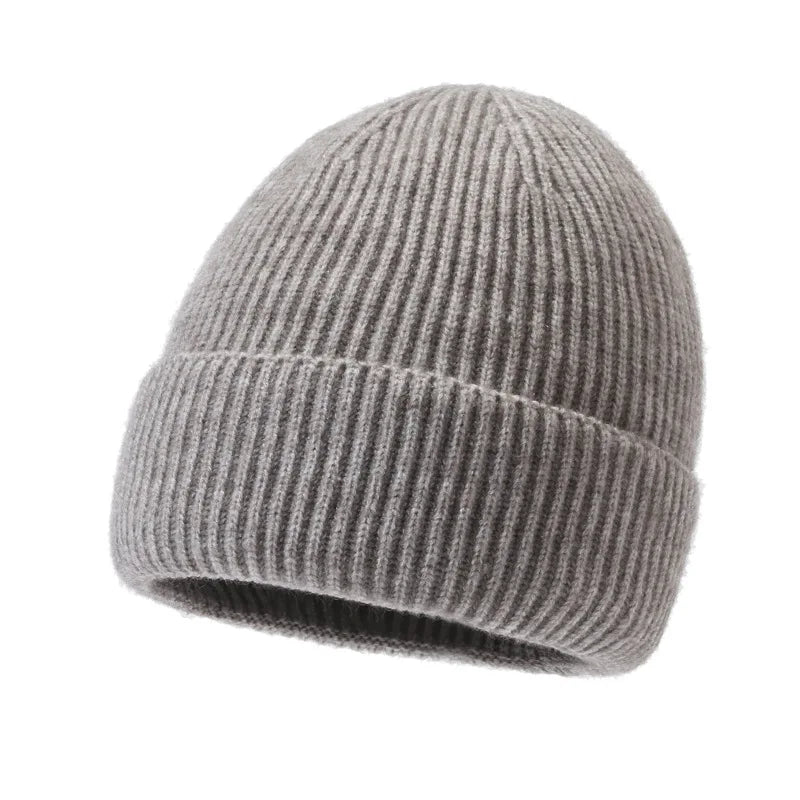Warm knitted melon winter beanie hat for women and men, textured knit design in a cozy style